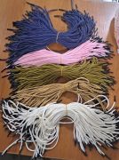 Knitted paper cord with black tips